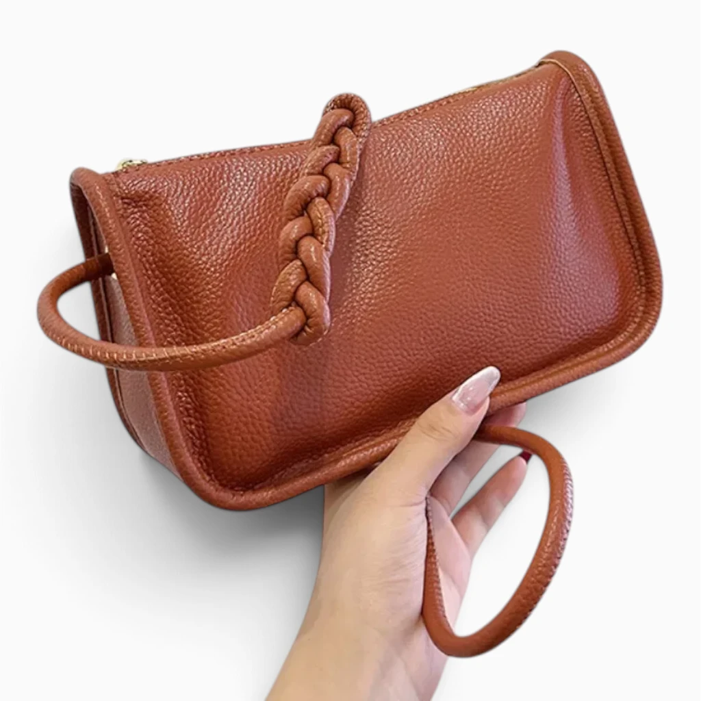 Clutch sac fermé, finition élégante avec coutures apparentes sur les côtés