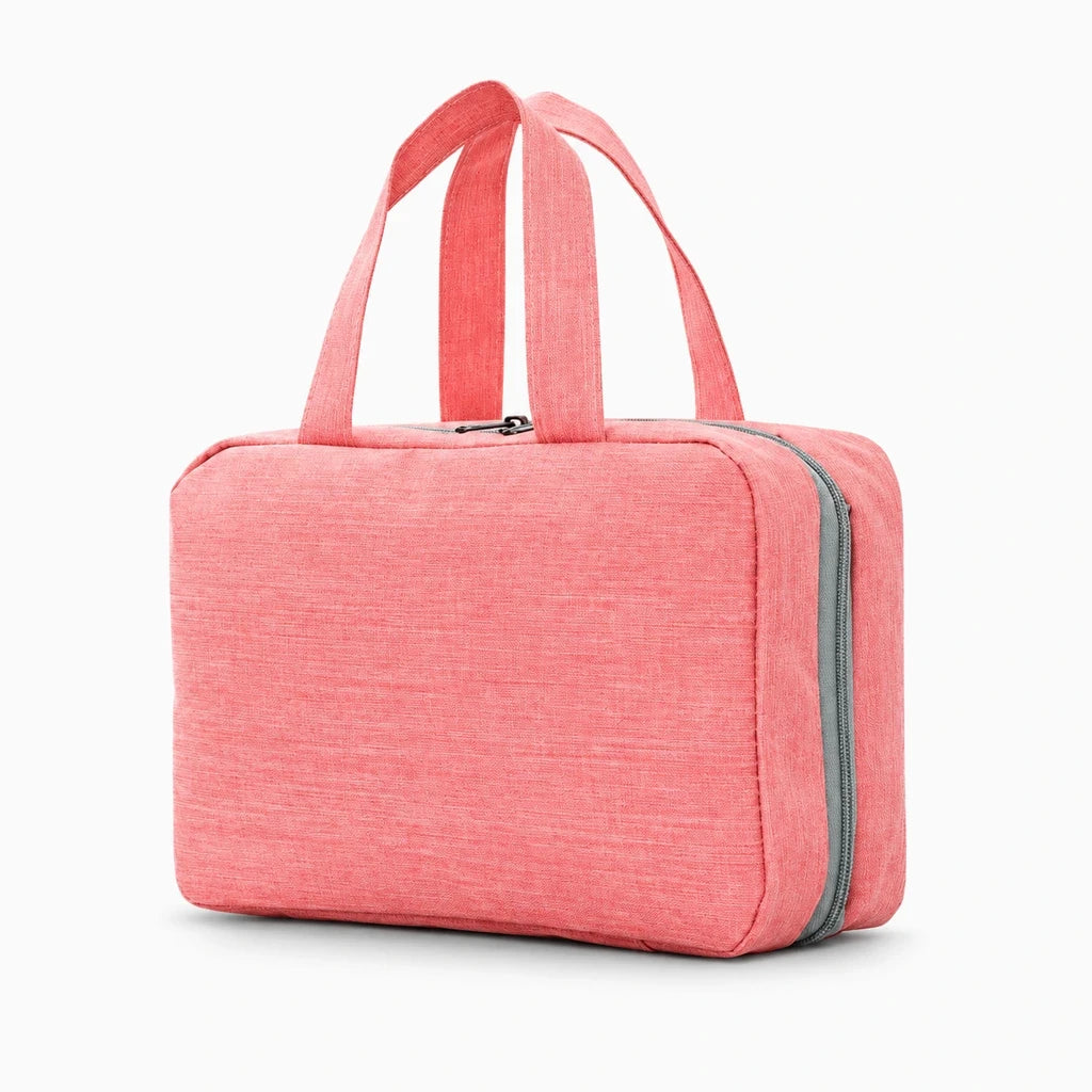 Grand sac de rangement toilette homme bleu marine ouvert montrant les multiples poches