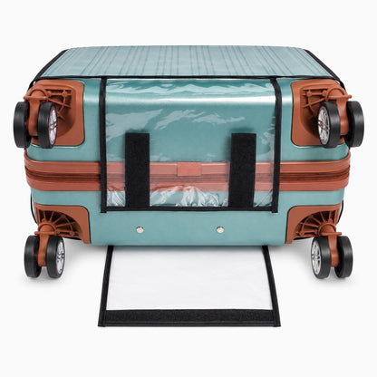 Housse protection valises turquoise, vue de dessus sur bagage, protection anti-poussière
