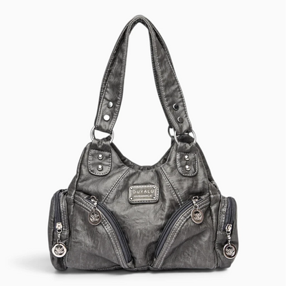 Petit sac à mains noir fermé, silhouette épurée et soignée