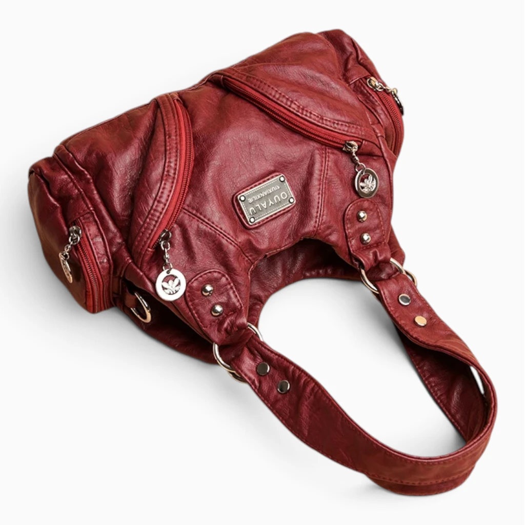 Bandoulière ajustable du sac noir, détail de la boucle de réglage