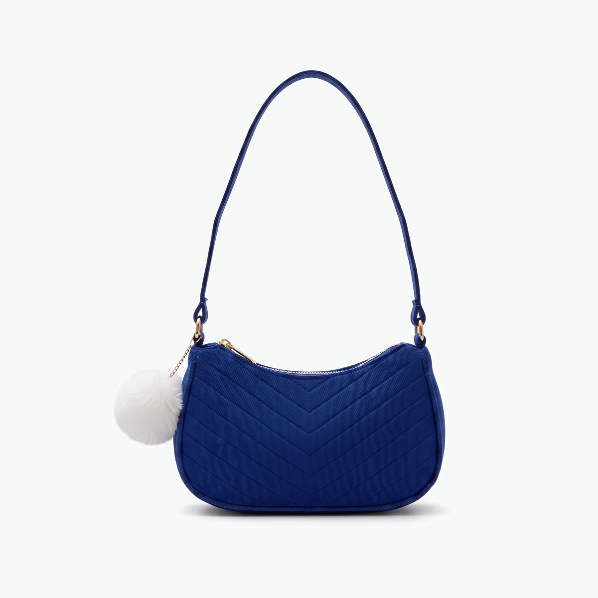 Petit sac femme bandoulière bleu porté à l'épaule, texture feutre lisse