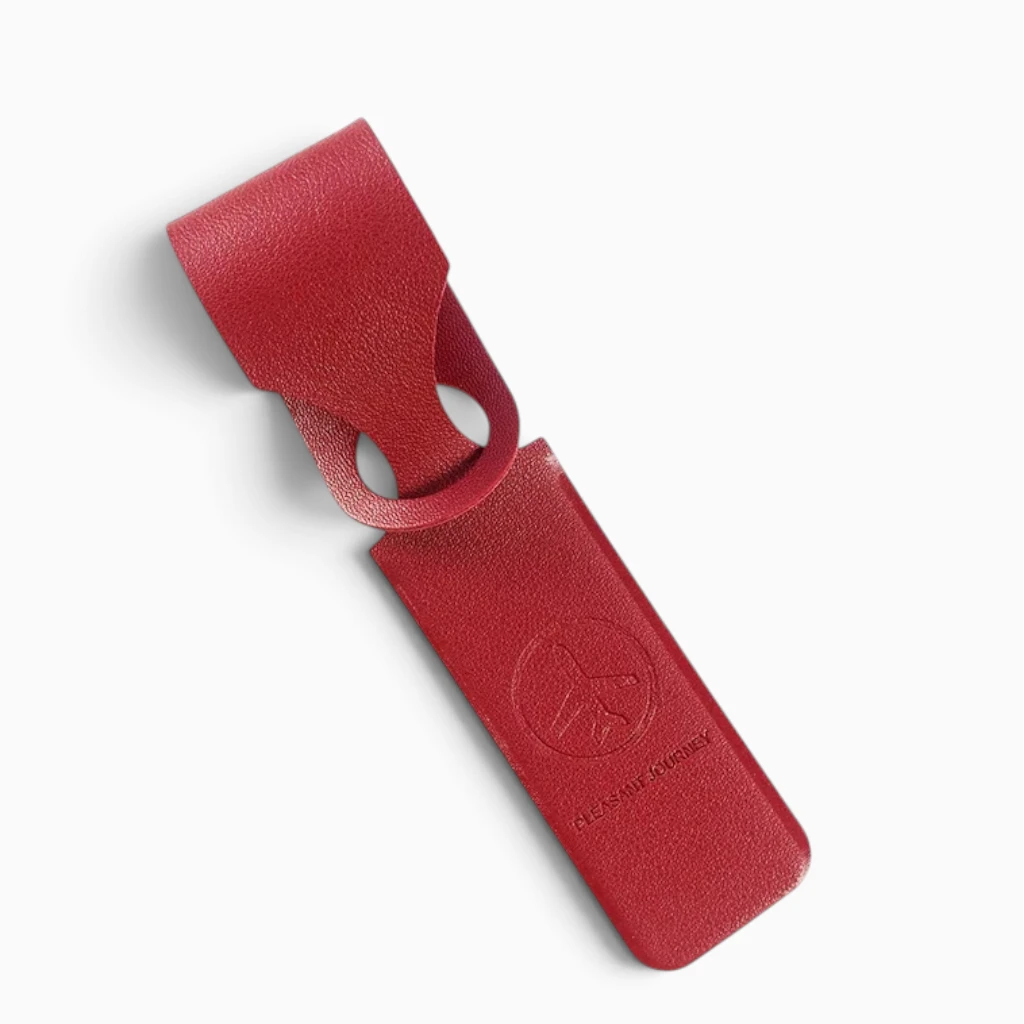Porte étiquette pour valise gris, détail de la sangle d'attache