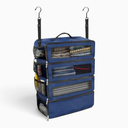 Organisateur de bagages bleu ouvert montrant compartiments de séparation