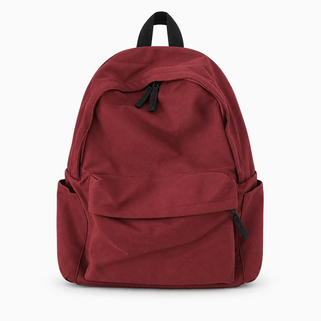 Détail de la toile et de la bandoulière ajustable du sac à dos 15l