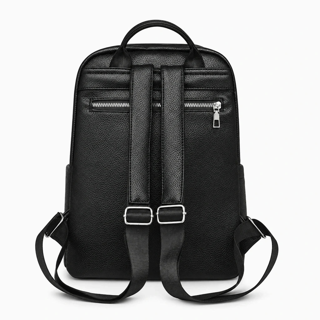 Vue de face du sac à dos femme sport ouvert révélant compartiments intérieurs et rangements
