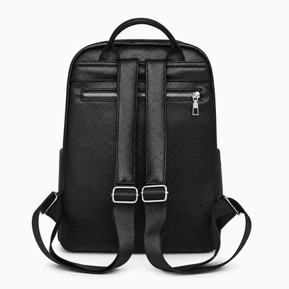 Vue de face du sac à dos femme sport ouvert révélant compartiments intérieurs et rangements