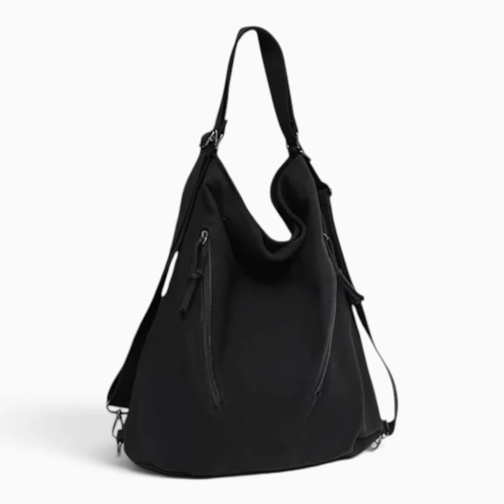 Vue de face du sac à dos ville ultra léger femme noir avec bandoulière ajustable