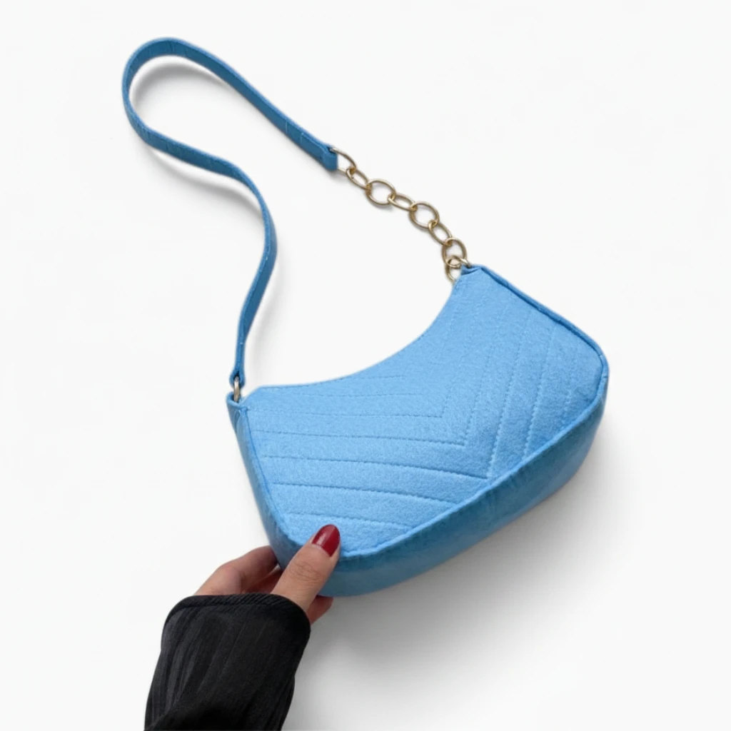 Profil du sac à main épaule croissant, matière texturée et douce