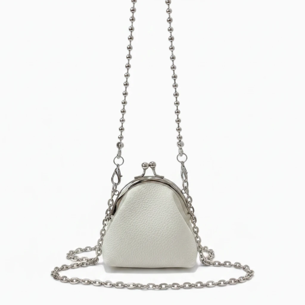 Sac à main femme tendance 2025 noir avec chaîne métallique, format mini tube