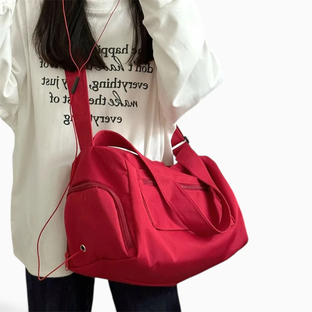Sac à main vert de capacité généreuse, idéal pour city bag ou sport
