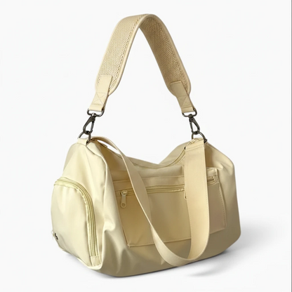 Sac à main vert clair aux formes arrondies, accessoire polyvalent urban et casual