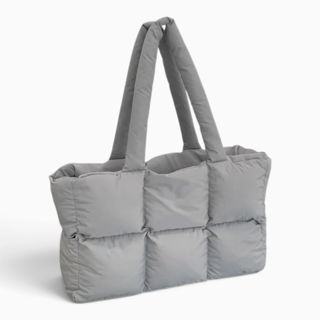 Sac en bandoulière femme marron porté à l'épaule, vue de face