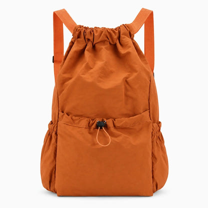 Sac cordon compact plié se glissant facilement dans une poche ou un bagage