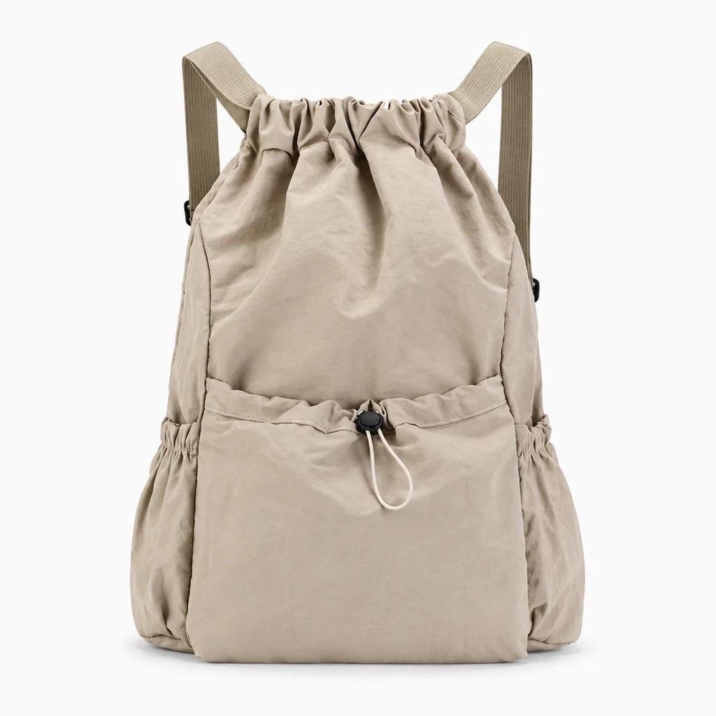 Détail de la fermeture par cordon de serrage du sac à dos compact