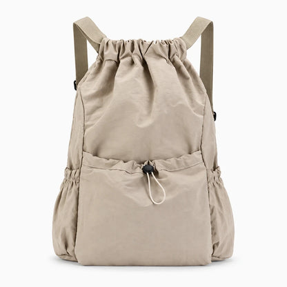 Détail de la fermeture par cordon de serrage du sac à dos compact